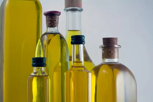 Bottles of extra virgin olive oil Royalty Free Stock Photos