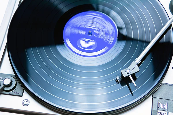 Vintage record player with spinning vinyl — Stock Photo, Image