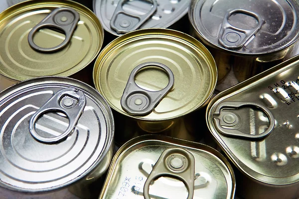 Tins of different sizes and closed — Stock Photo, Image