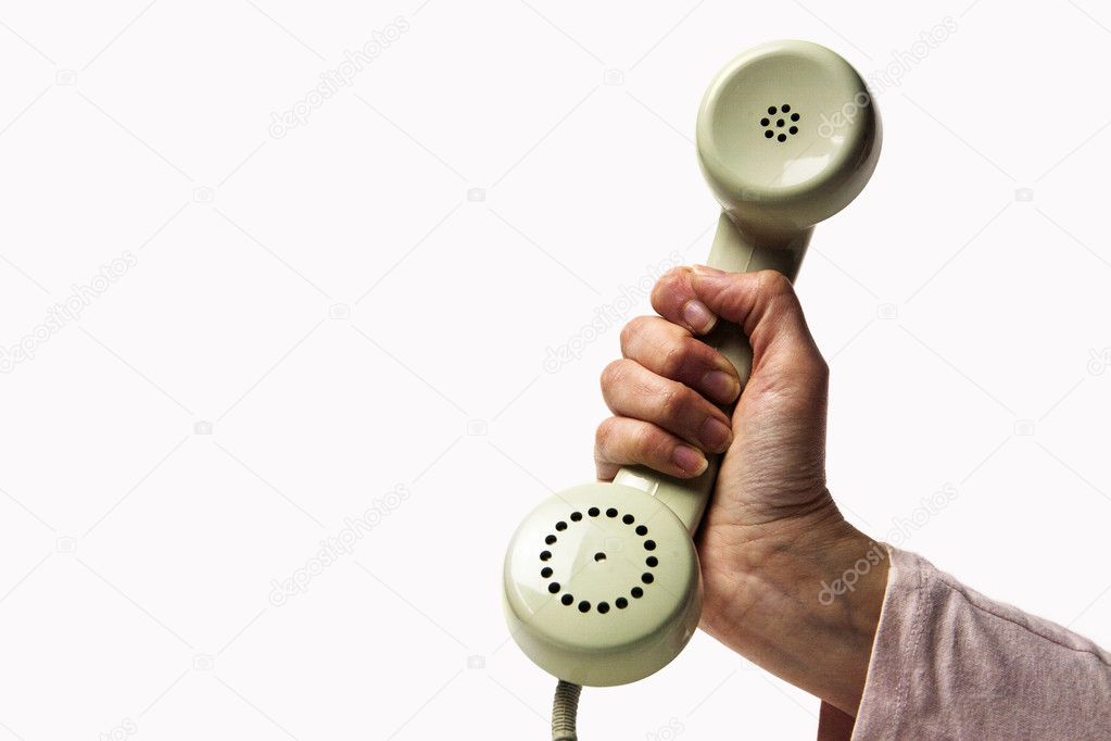 Vintage telephone receiver isolated on white background