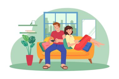 Young couple sitting on the sofa playing a game