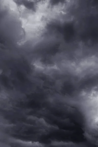 Storm sky with dark gray black epic rainy clouds background texture, hurricane with thunderstorm, cyclone