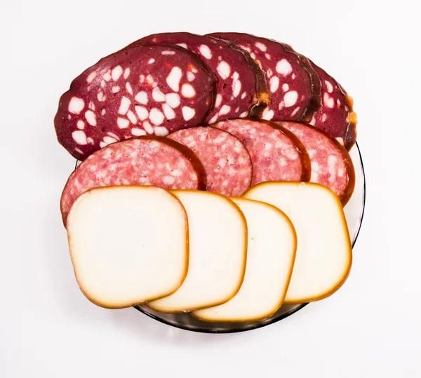 Сочная колбаса и копченый сыр — стоковое фото