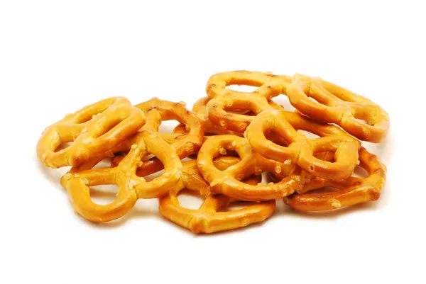 Pretzels op wit — Stockfoto