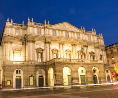 La Scala opera theatre in milano.Night view with light effect clipart