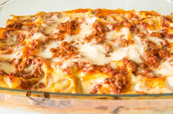 Original italian lasagne on a baking dish — Stock Photo, Image