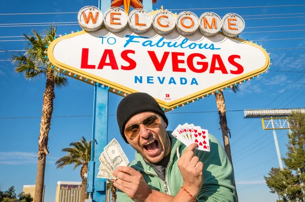 Spieler mit Dollars und Royal Flush in Las Vegas — Stockfoto