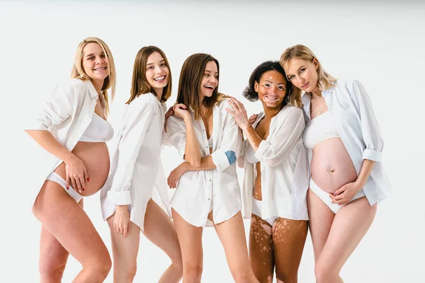 Happy Pregnant Women Big Bellies Beautiful Mothers Posing Studio Multiracial — Stock Photo, Image
