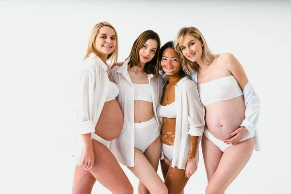 Happy Pregnant Women Big Bellies Beautiful Mothers Posing Studio Multiracial — Stock Photo, Image