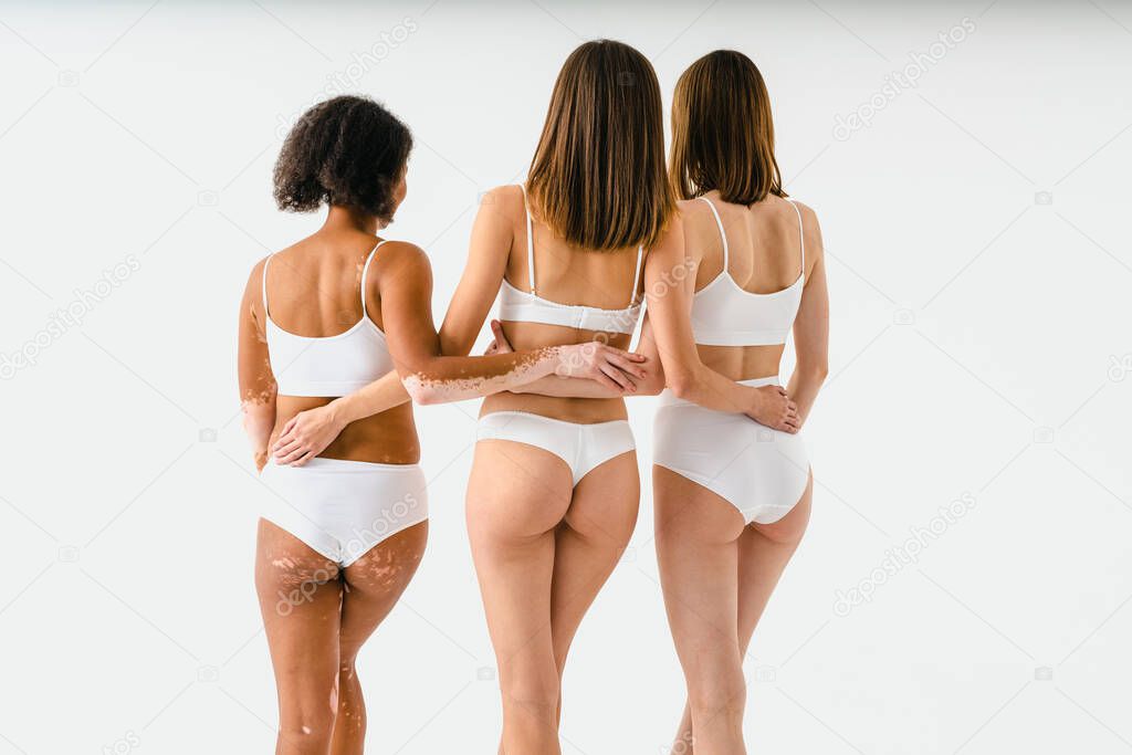 Portrait of multicultural group of women with diverse bodies celebrating self love and self acceptance, rear wiew - Beauty shot of multiethnic models, concepts about people, body postive, body acceptance and diversity