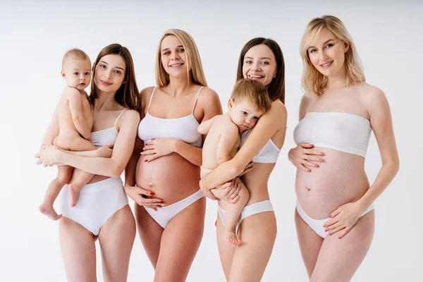 Happy Pregnant Women Big Belly Beautiful Mothers Babies Studio Multiracial — Stock Photo, Image