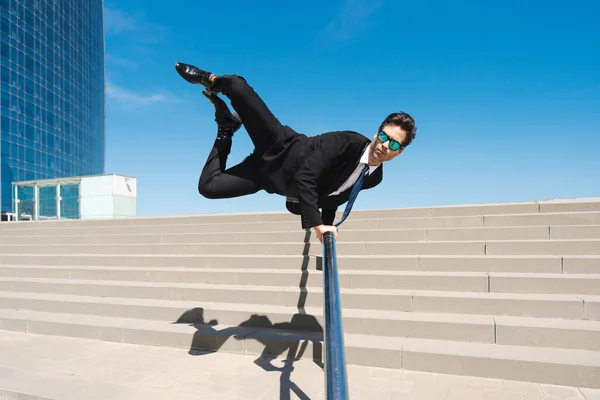 Happy Handsome Adult Businessman Wearing Elegant Suit Doing Acrobatic Trick — Stock Photo, Image