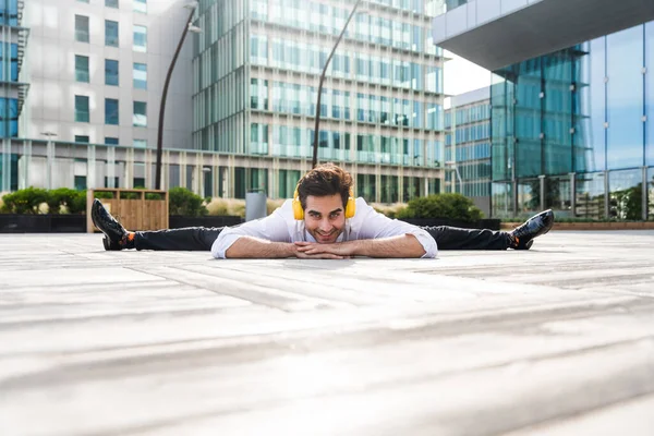 Happy Handsome Adult Businessman Wearing Elegant Suit Doing Acrobatic Trick — Stockfoto