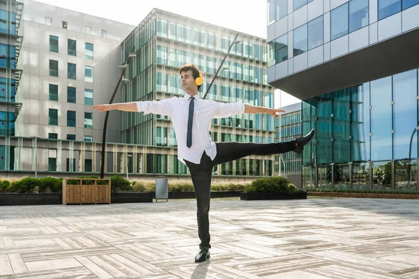 Happy Handsome Adult Businessman Wearing Elegant Suit Doing Acrobatic Trick — Zdjęcie stockowe