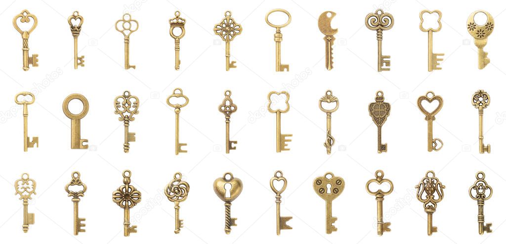 Set of 30 vintage gold keys isolated on white background. Antique design concept