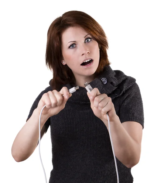 Woman disconnects cable — Stock Photo, Image