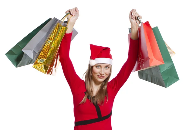 Young shopping woman with Christmas hat — Stock Photo, Image