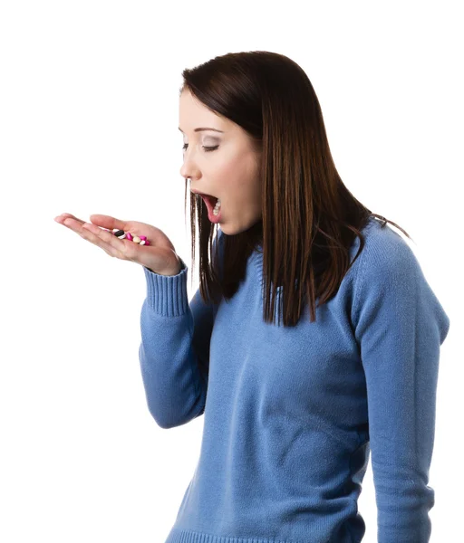 Woman taking pills — Stock Photo, Image