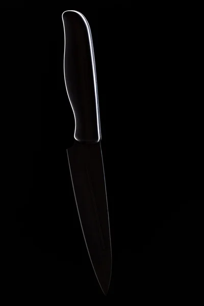 Couteau de cuisine sur fond noir — Photo