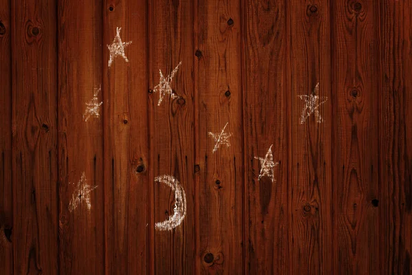 Child's drawing of the moon and stars on the wall — Stock Photo, Image