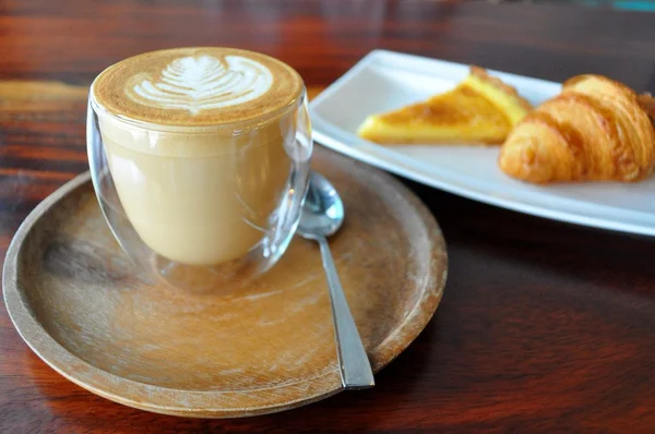 Coffe break - hot latte, croissant, lemon tart — Stock Photo, Image