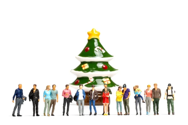 Miniature people,  A group of people celebrating Christmas, Christmas and Happy New Year concept.