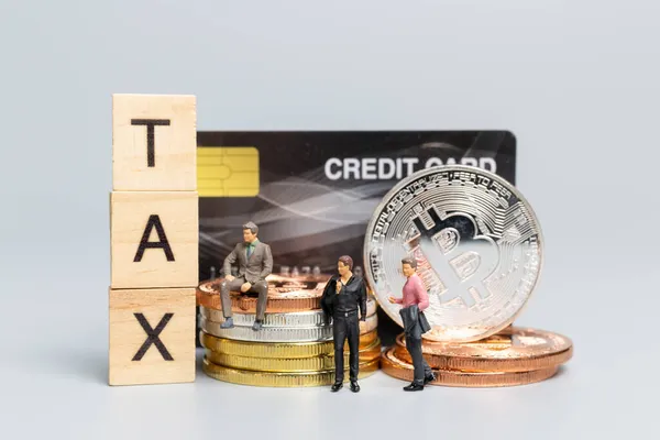 Miniature People Businessman Crypto Currency Wooden Letters Tax Gray Background — Stock Photo, Image