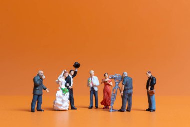 Miniature people Couple live stream marriage ceremony concept , Happy Valentines Day