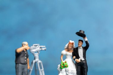 Miniature people Couple live stream marriage ceremony concept , Happy Valentines Day
