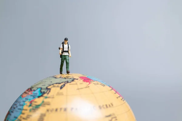 Travelers Miniature Standing Globe Making Way Destination Travel Concept — 图库照片