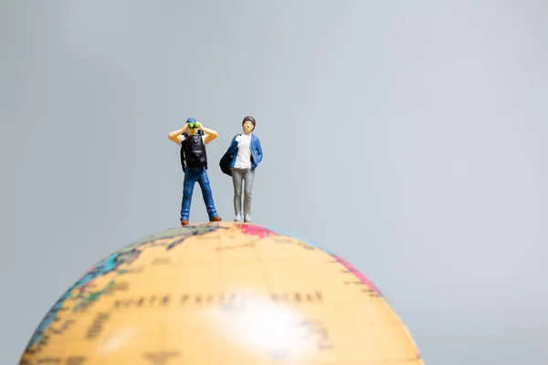 Travelers Miniature Standing Globe Making Way Destination Travel Concept — 图库照片