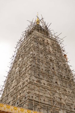 Kanchanaburi, Thailand - June 25, 2022  Phuthakaya pagoda, Bodhgaya Stupa at Sangklaburi, Kanchanaburi, Thailand.