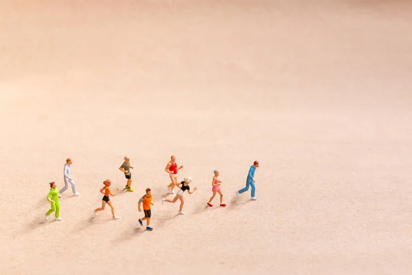 Miniature People Exercising While Running Group Beach Living Active Lifestyle — Stock fotografie