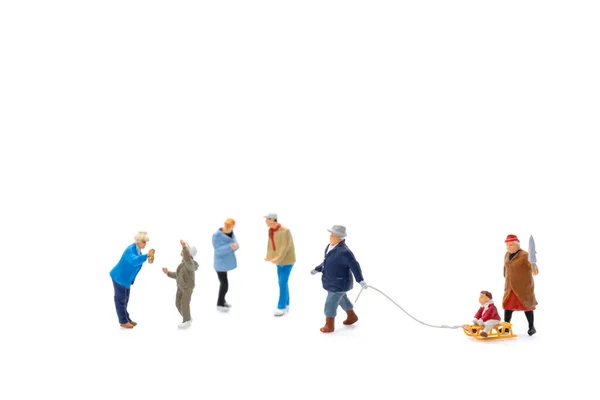 Miniature People Happy Family Ride Sleigh White Background Christmas Eve — Stock fotografie