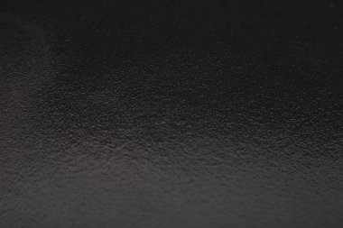 Koyu gri arka plan. Taşın dokusu yakın plan. Grafik arkaplan makrosu.