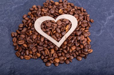 Coffee beans copy space background heart shaped food frame