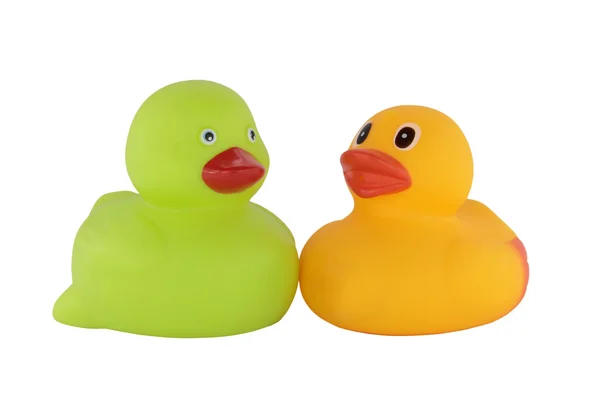 Couple of green and yellow rubber ducklings isolated on white background — Stock Photo, Image