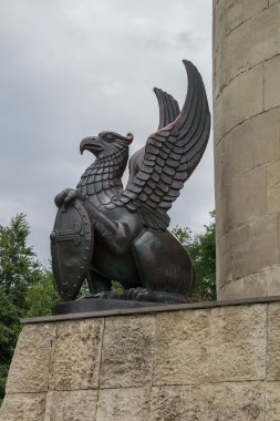 Russia. Griffin right of the pedestal of the monument to Ilya Muromets in Murom clipart