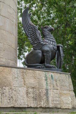 Russia. Griffin right of the pedestal of the monument to Ilya Muromets in Murom clipart