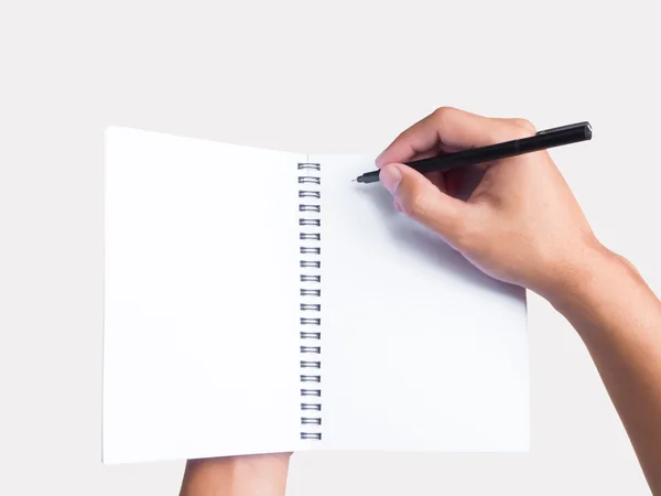 Notebook en pen in de hand — Stockfoto