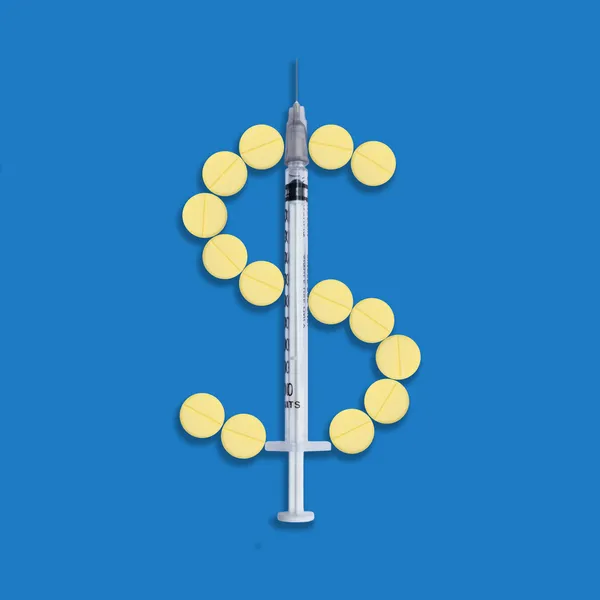 Dollar of pills and syringe — Stock Photo, Image
