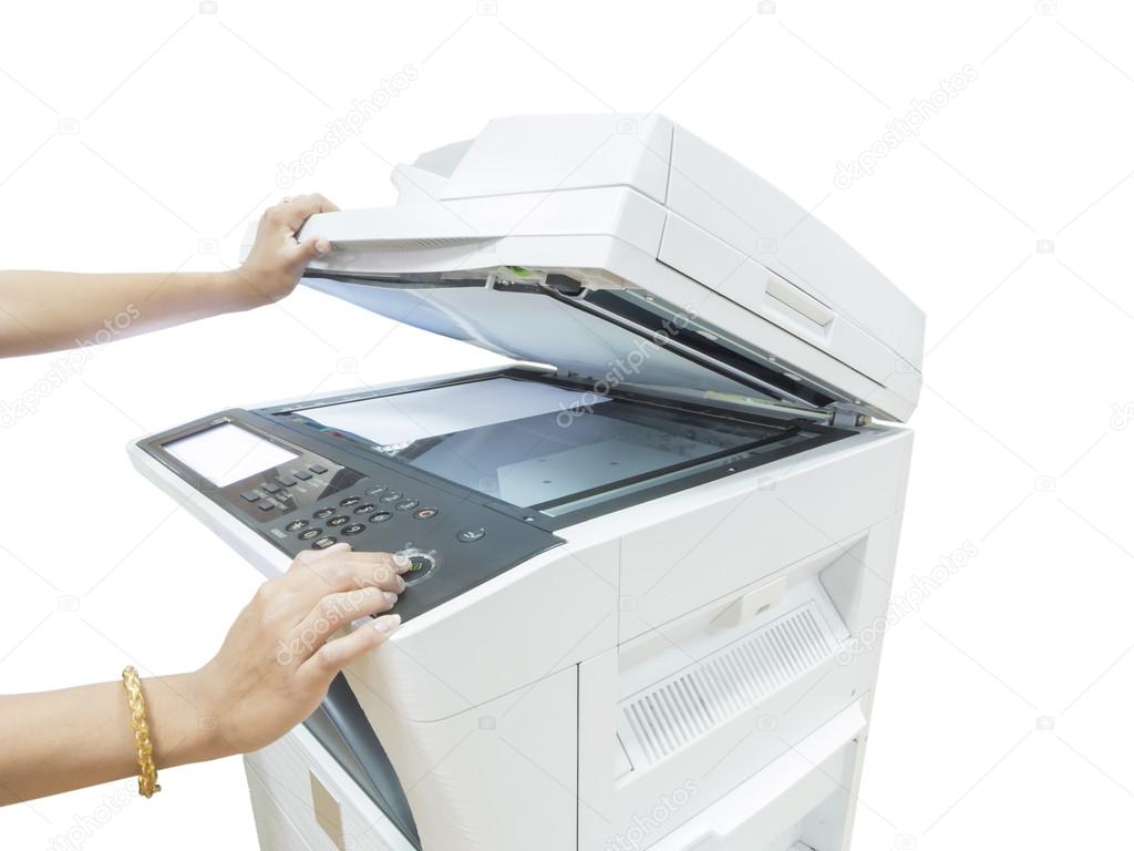 Hand holding copier machine