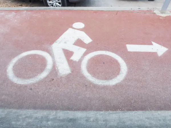 White painted sign for bikes lane — Stock Photo, Image