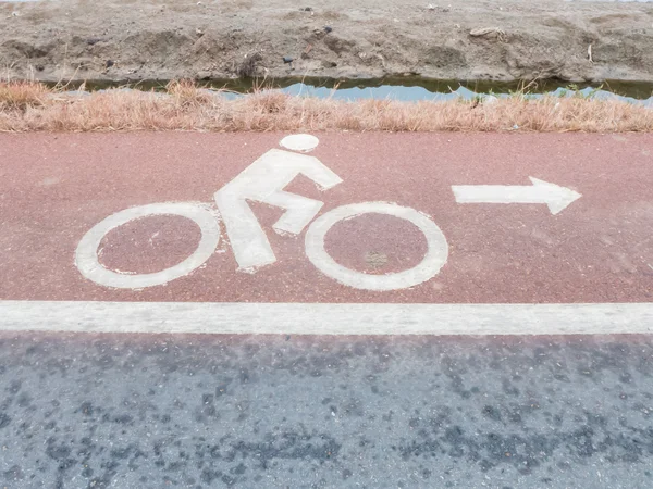White painted sign for bikes lane — Stock Photo, Image
