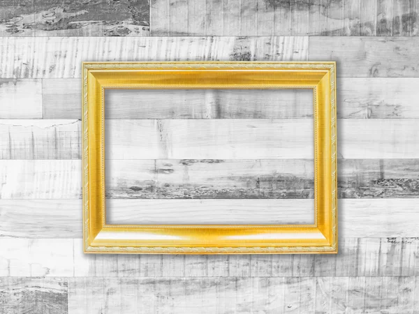 Rámeček zlatý obrázku na zdi dřevěné prkno — Stock fotografie