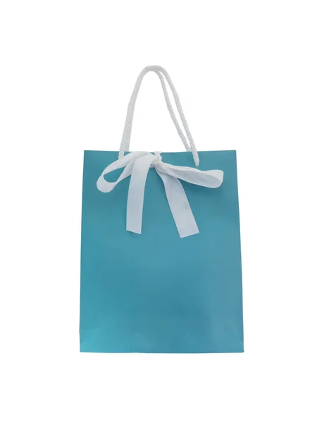 Shopping bag di carta blu con fiocco bianco — Foto Stock