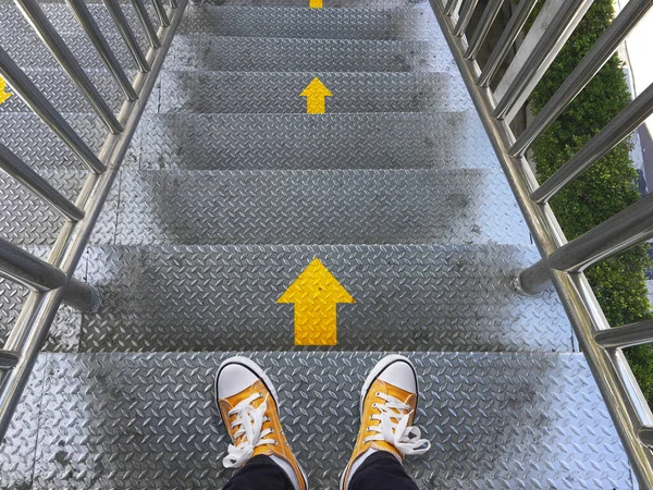 Looking Feet Put Shoes Yellow Arrows Direction Flyover Street Safety Stock Picture