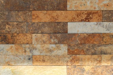 Dış duvar ve zemin dekorasyonu için taş tuğlalarla kaplı yüzey