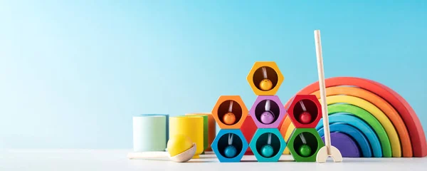 Colorful Toys Little Children Development Light Blue Background Wooden Items — Stock Photo, Image