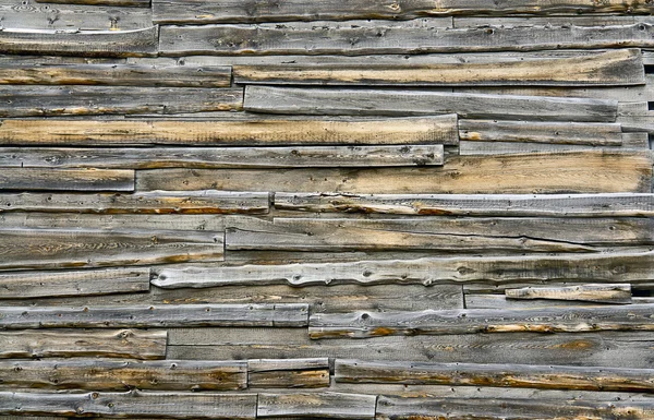 Old wall of wooden sheds. — Stock Photo, Image